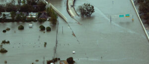 Figure 2: Flooded roadways can be seen as the Coast Guard conducts initial Hurricane Katrina damage assessment overflights. (U.S. Coast Guard photograph by Petty Officer 2nd Class Kyle Niemi/Released)