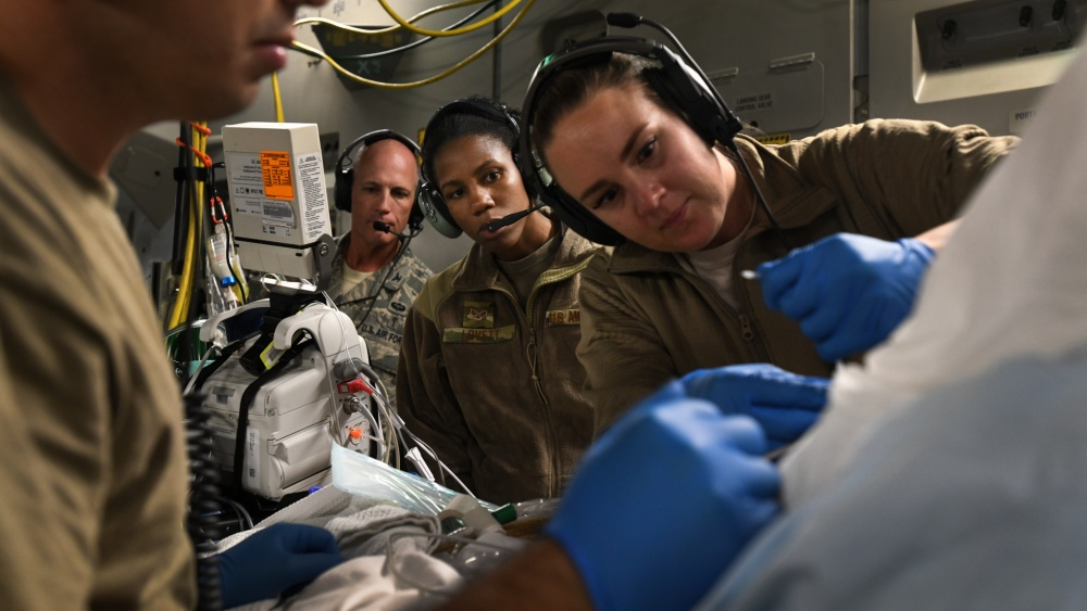 Medical Military Personnel performing training.