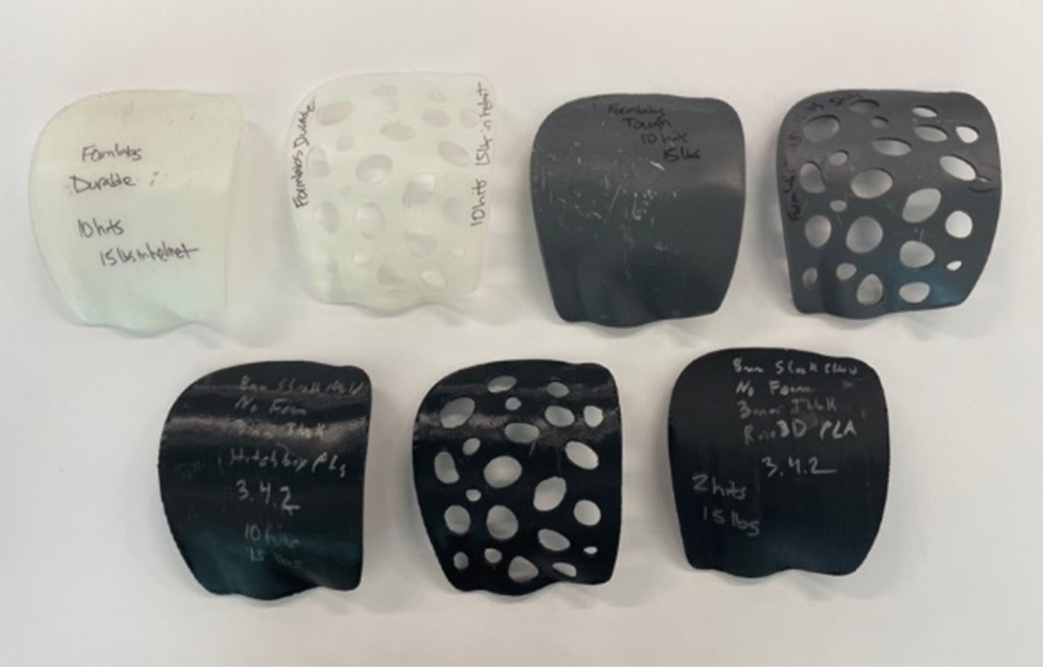 Figure 2. Shoulder Guards: (Top Row, Left to Right) Formlabs Durable Solid, Durable Holed, Tough Solid, and Tough Holed and (Bottom Row, Left to Right) Hatchbox PLA Solid, Hatchbox PLA Holed, and Raise3D PLA Solid