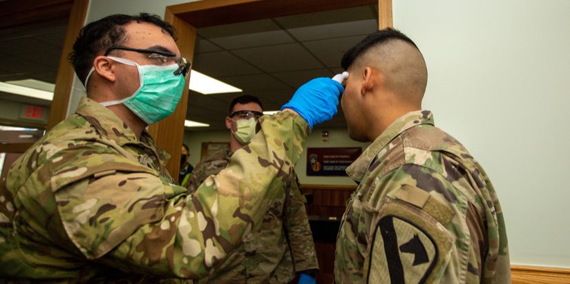 Soldiers stationed on U.S. Army Garrison Casey conduct pre-screening processes on individuals awaiting entry to the base, USAG-Casey, Dongducheon, Republic of Korea, Feb. 26, 2020. Additional screening measures of a verbal questionnaire and temperature check are in response to the heighted awareness of Coronavirus (COVID-19) following a surge in cases throughout the Republic of Korea and are meant to help control the spread of COVID-19 and to protect the force (U.S. Army photo by Sgt. Amber I. Smith).
