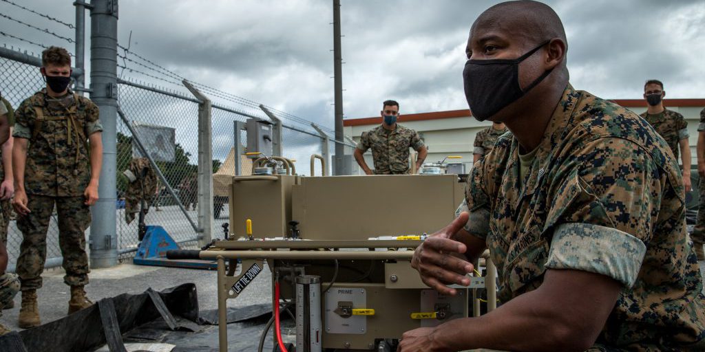 U.S. Marine Corps Sgt. Calvin Gravette III, a bulk fuel specialist with Bulk Fuel Company, 9th Engineer Support Battalion, 3rd Marine Logistics Group (MLG), instructs Marines on the Expeditionary Mobile Fuel Additization (EMFAC) on Camp Hansen, Okinawa, Japan, May 12, 2021. Gravette is a graduate from the EMFAC New Equipment Training and is the lead EMFAC training instructor for III Marine Expeditionary Force (MEF). 3rd MLG, based out of Okinawa, Japan, is a forward deployed combat unit that serves as III MEF’s comprehensive logistics and combat service support backbone for operations throughout the Indo-Pacific area of responsibility (U.S. Marine Corps photo by Lance Cpl. Courtney A. Robertson).