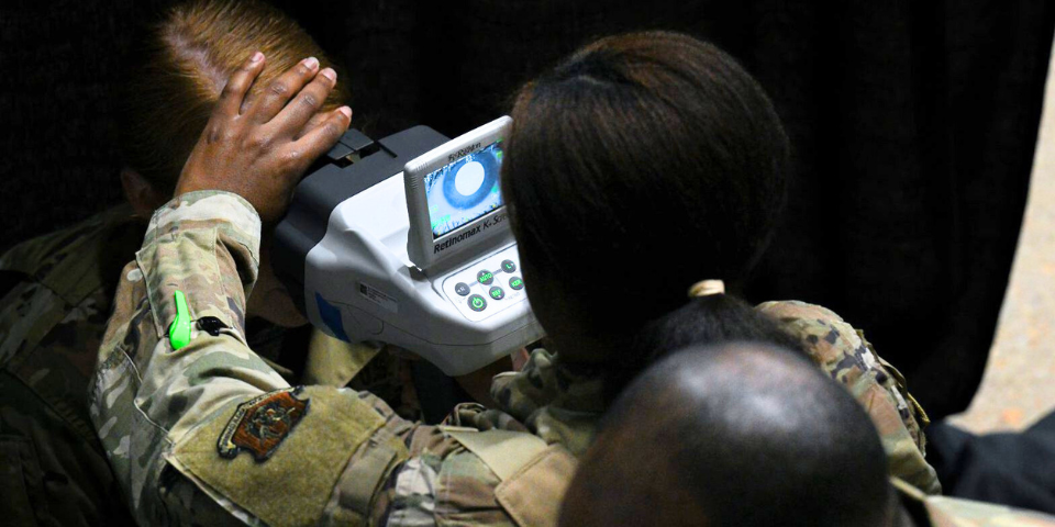 A U.S. Airman simulates an eye exam on Aug. 2, 2023, at Monroe Civic Center, LA, in preparation for the soft-opening of the Innovative Readiness Training Program’s Monroe Wellness Mission 2023. Monroe Wellness is a two-week, hands-on Joint Force medical training mission that provides no-cost medical services to Monroe, West Monroe, and their surrounding areas (U.S. Air Force photo by Staff Sgt. Christina Russo).