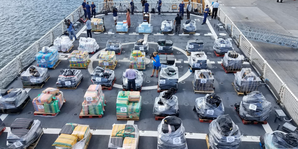 Source:  photo by Petty Officer 1st Class Luke Clayton, https://www.southcom.mil/media/news-articles/article/1188935/coast-guard-offloads-more-than-18-tons-of-cocaine-in-port-everglades/.
