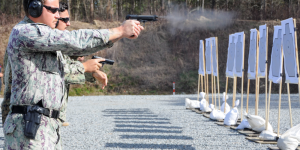 3 Military Personnel participating in firearms training