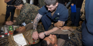 Military Personnel perform mass casualty exercise.
